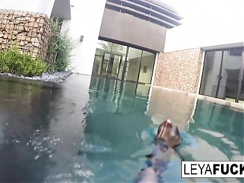 Leya and Lynn have a lesbian romp in a pool